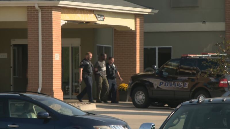 Normal Police took Michael A. Sumpter into custody after a standoff at Comfort Suites on...