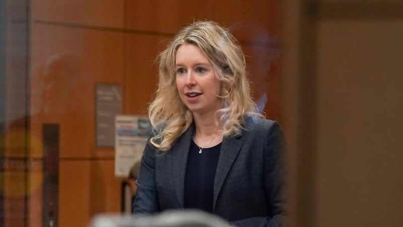 Former Theranos CEO Elizabeth Holmes arrives at federal court in San Jose, Calif., on Oct. 17,...