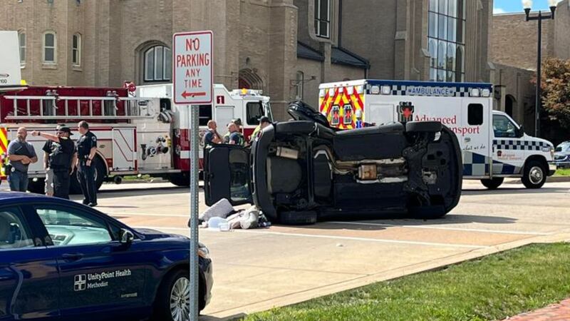 First responders respond to a rollover accident on Randolph in Peoria Tuesday.